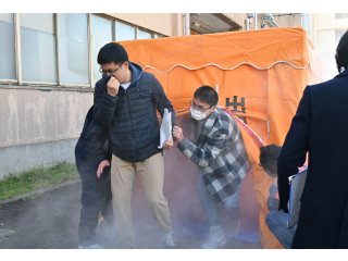 Evacuation drill in smoke tent